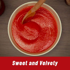 Mutti passata glass bottle showcasing bright red color for vibrant dishes.