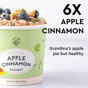 MYLK LABS Apple Cinnamon Oatmeal Cup ingredients close-up with real apples and oats