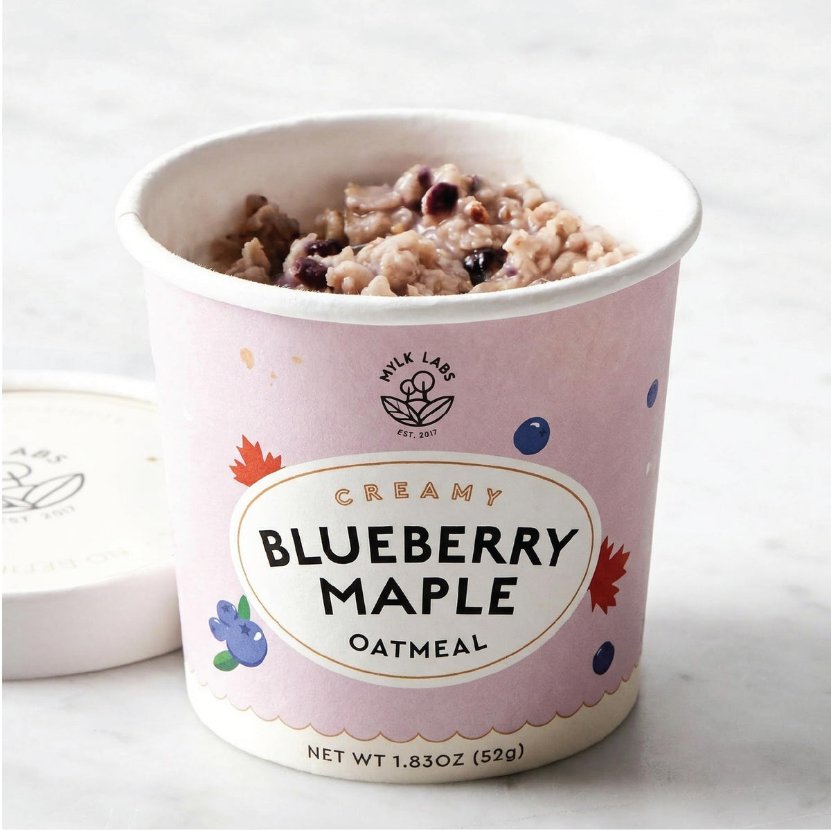 MYLK LABS Blueberry Maple Protein Oatmeal Cup protein and fiber rich option for mornings.