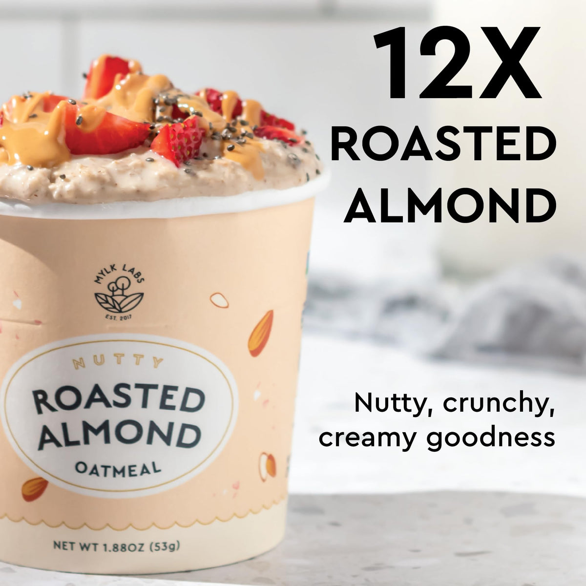 MYLK LABS Roasted Almond Oatmeal Cup displays a thick, creamy texture for a satisfying morning.