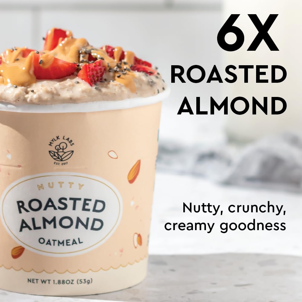 MYLK LABS Roasted Almond Oatmeal Cup opened to reveal oats and ingredients.