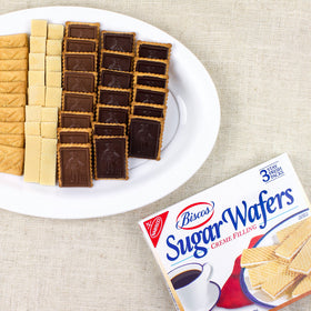 NABISCO Biscos wafers dipped in chocolate, an indulgent dessert pairing.