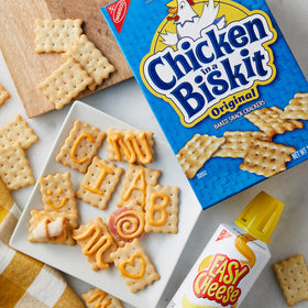 Party board featuring NABISCO Chicken in a Biskit crackers with meats.
