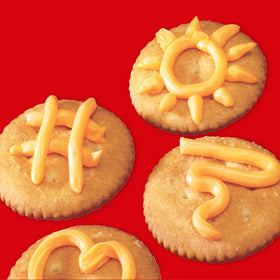 NABISCO Easy Cheese cheddar spray can close-up nozzle.