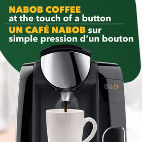 NABOB Rainforest Alliance-certified coffee disc highlights sustainable farming.