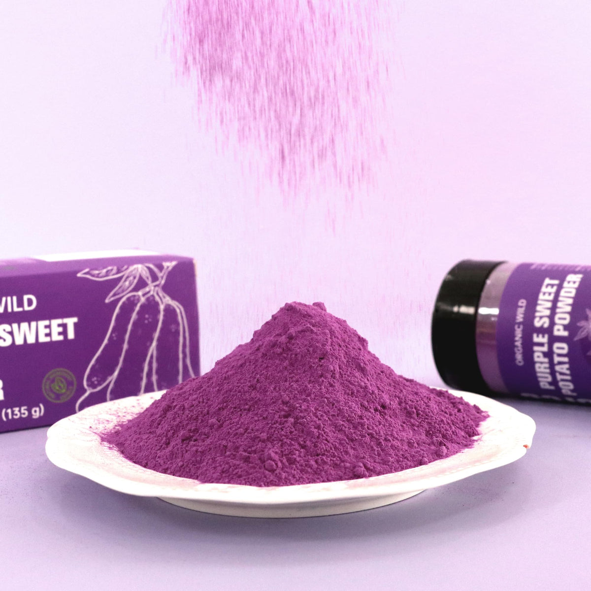 Nacolorce purple powder pours into smoothie to add color and mild sweetness.