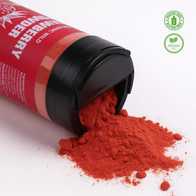 Powder dusting a cake with Nacolorce for natural strawberry tint.