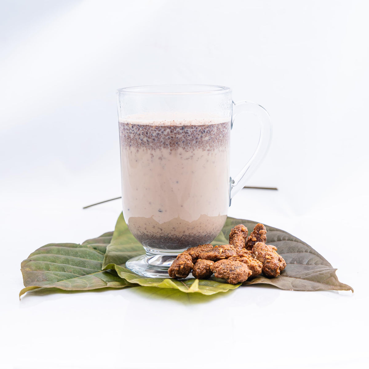 NAHUATL cacao beans sun-dried during traditional processing for flavor.