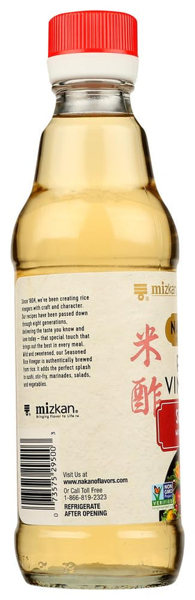 Nakano Rice Vinegar Seasoned Original bottle being poured over greens