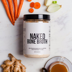 NAKED bone broth protein powder container near clean ingredients on countertop.