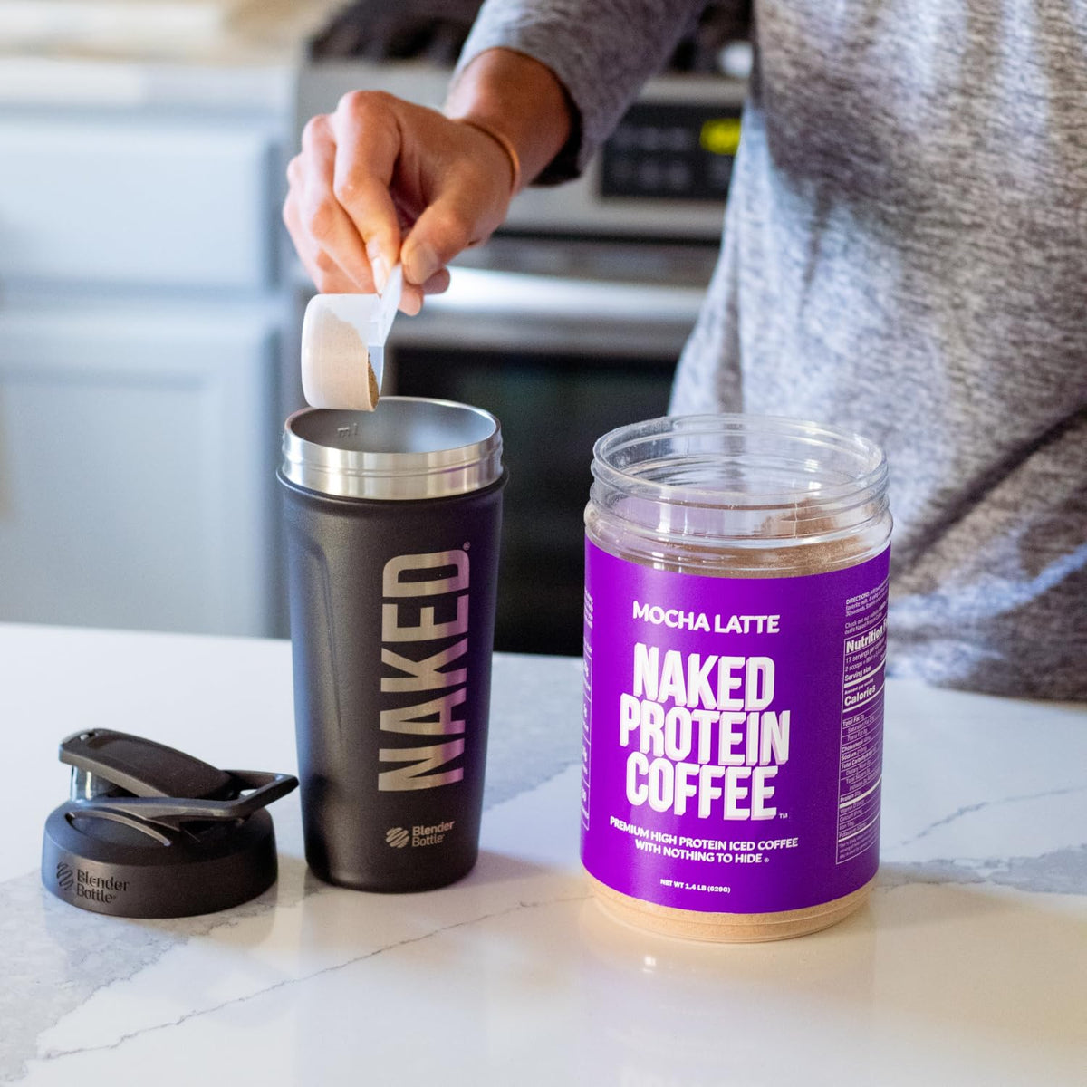 NAKED Mocha Latte Protein Coffee on ice shows refreshing chill.