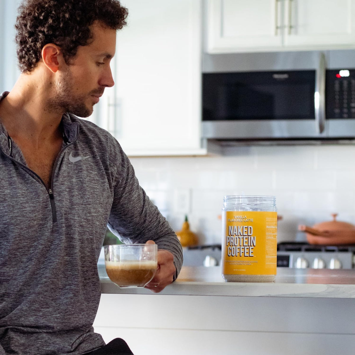 NAKED Vanilla Latte morning routine boost image suggests focused energy.