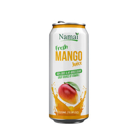 Namai Pure Mango Juice kitchen table moment, family enjoys a refreshing drink.