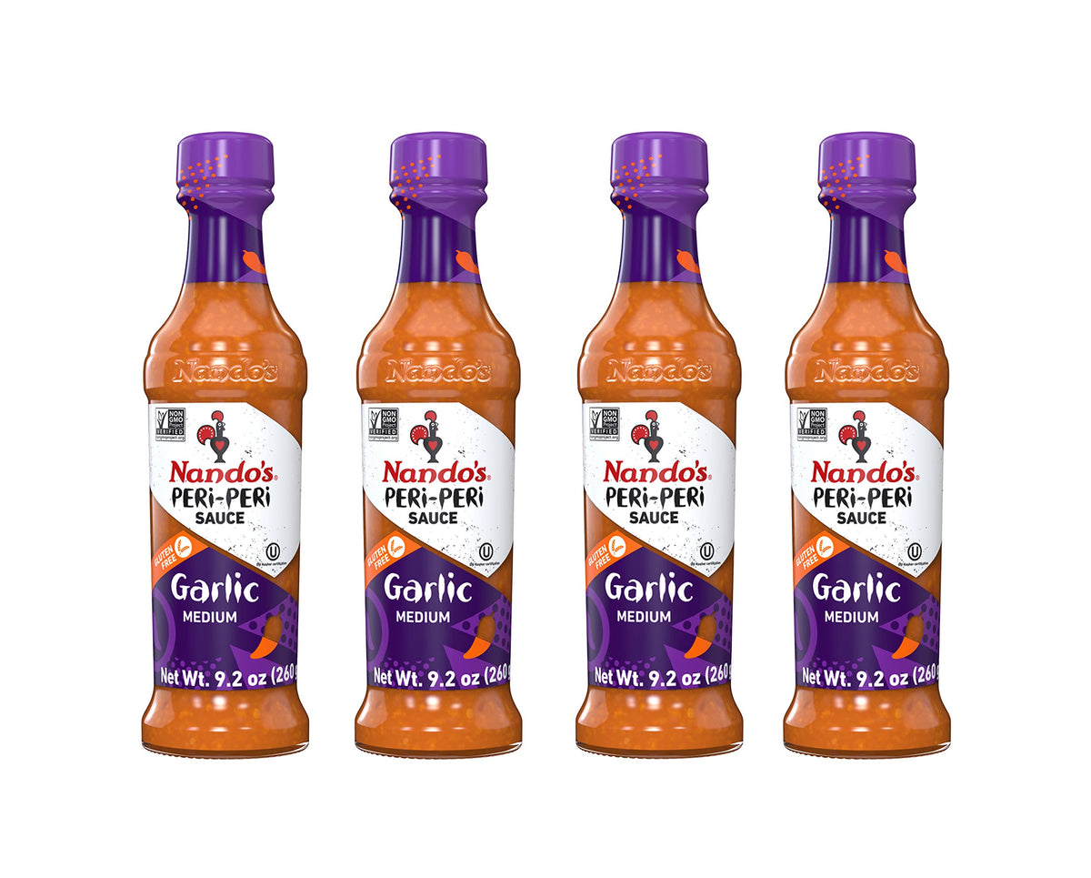 Nando's PERi PERi Garlic Sauce bottle front for bold flavor.