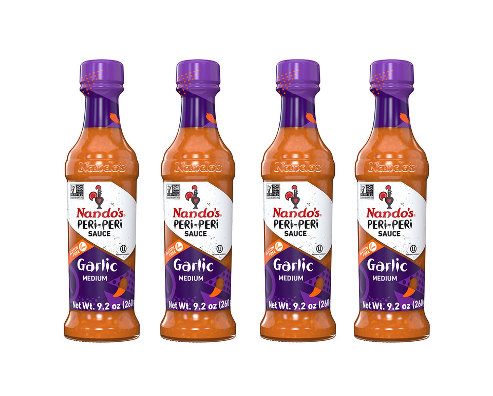 Nando's PERi PERi Garlic Sauce bottle front for bold flavor.