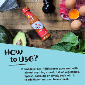 Nando's PERi PERi Garlic Sauce on grilled chicken.