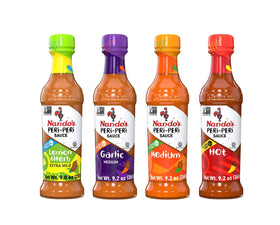 Nando's PERi-PERi gift pack front view showing four sauce bottles for versatile meals