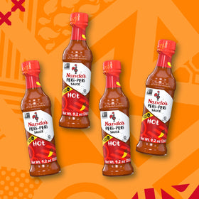 Nando's PERi-PERi sauce on wings for spicy, flavorful bite