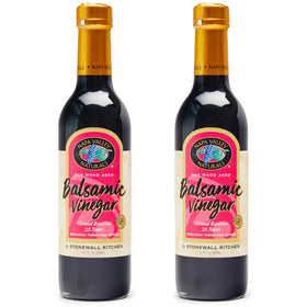 Napa Valley Naturals Grand Reserve balsamic bottle on kitchen shelf for elegant drizzle.