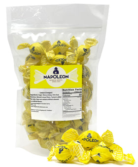 Napoleon Sour Lemon Balls close-up showing glossy shell and powder center for bold, long-lasting flavor.