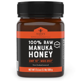 Nate's Honey Manuka jar with scoop showing rich daily-use texture.