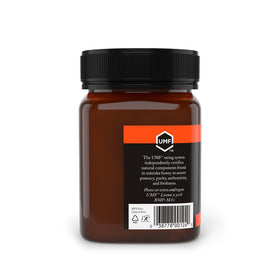 Nate's Manuka spoon drizzle shows thick, premium honey for spreading.