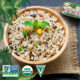 Native Forest Organic Sliced Water Chestnuts on a salad plate – crisp, refreshing topping.