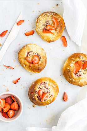 Native Vanilla Strawberry Extract pouring over bowl, ideal for batter flavoring