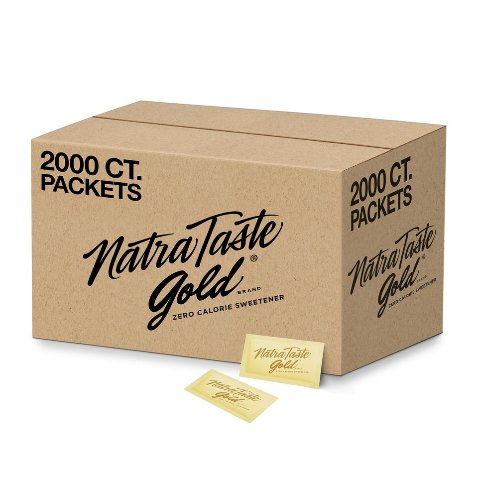 NatraTaste Gold zero calorie packets beside a coffee cup for sugar-free mornings.