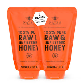 Nature Nate's honey bottle pour shows pure, unfiltered sweetness.