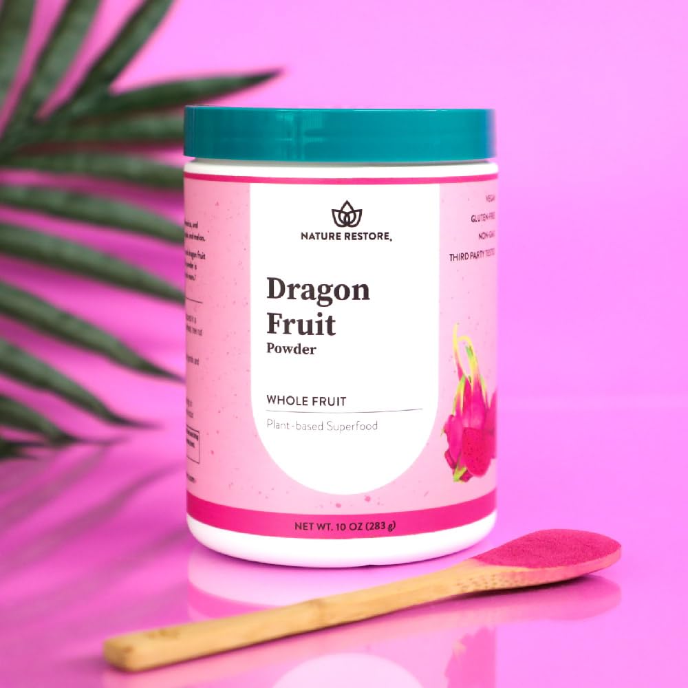 Nature Restore pink pitaya powder pour highlights bright color in beverages.