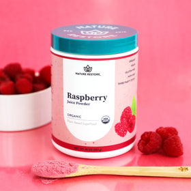 Nature Restore raspberry powder lab-test badge signals purity and safety.