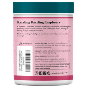 Nature Restore red raspberry powder scoop demonstrates texture ideal for smoothies.