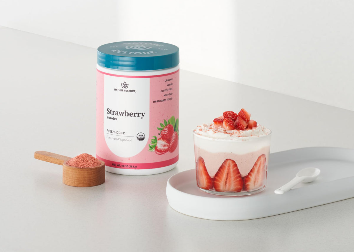 Nature Restore strawberry powder pour captures recyclable container and freshness.