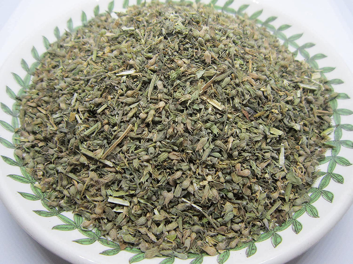 Nature Tea catnip-loose-leaf in a teacup ready for steeping.