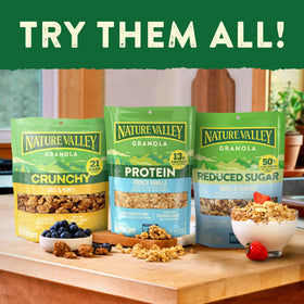 Visible whole grain oats and almonds in Nature Valley granola clusters.