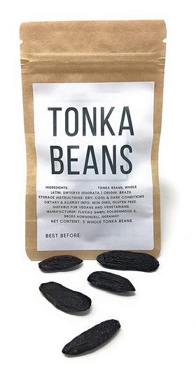 Naturegrail tonka beans ground powder bowl emphasizes spice use in baking and stews