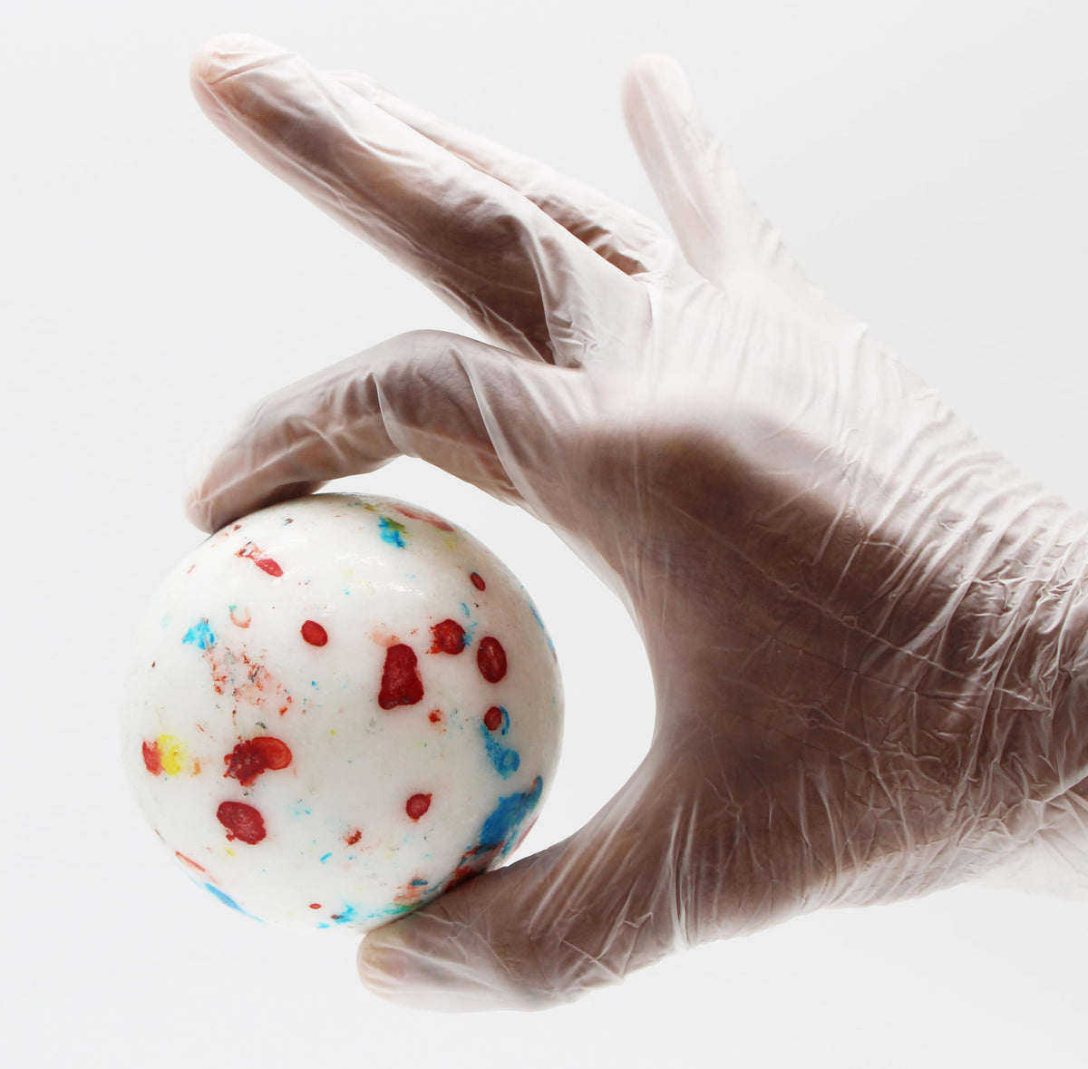 Naturejam jawbreaker 3-inch white speckled, close-up reveal colorful layers for slow-melt enjoyment.
