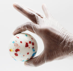 Naturejam jawbreaker 3-inch white speckled, close-up reveal colorful layers for slow-melt enjoyment.