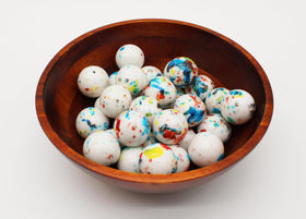 Naturejam wedding favors feature vibrant swirls for celebratory decorations.