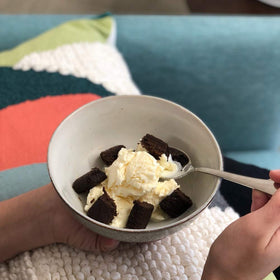 Nature's Bakery bite close-up—soft-baked texture and real fruit flavor