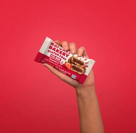 Nature's Bakery Gluten Free Fig Bars flaxseeds visible for wholesome bite.
