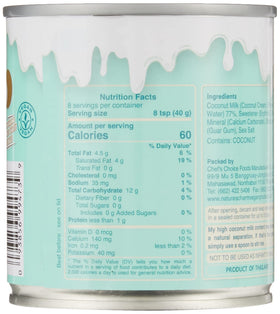 Nature's Charm sugar-free condensed coconut milk with wooden spoon for coffee