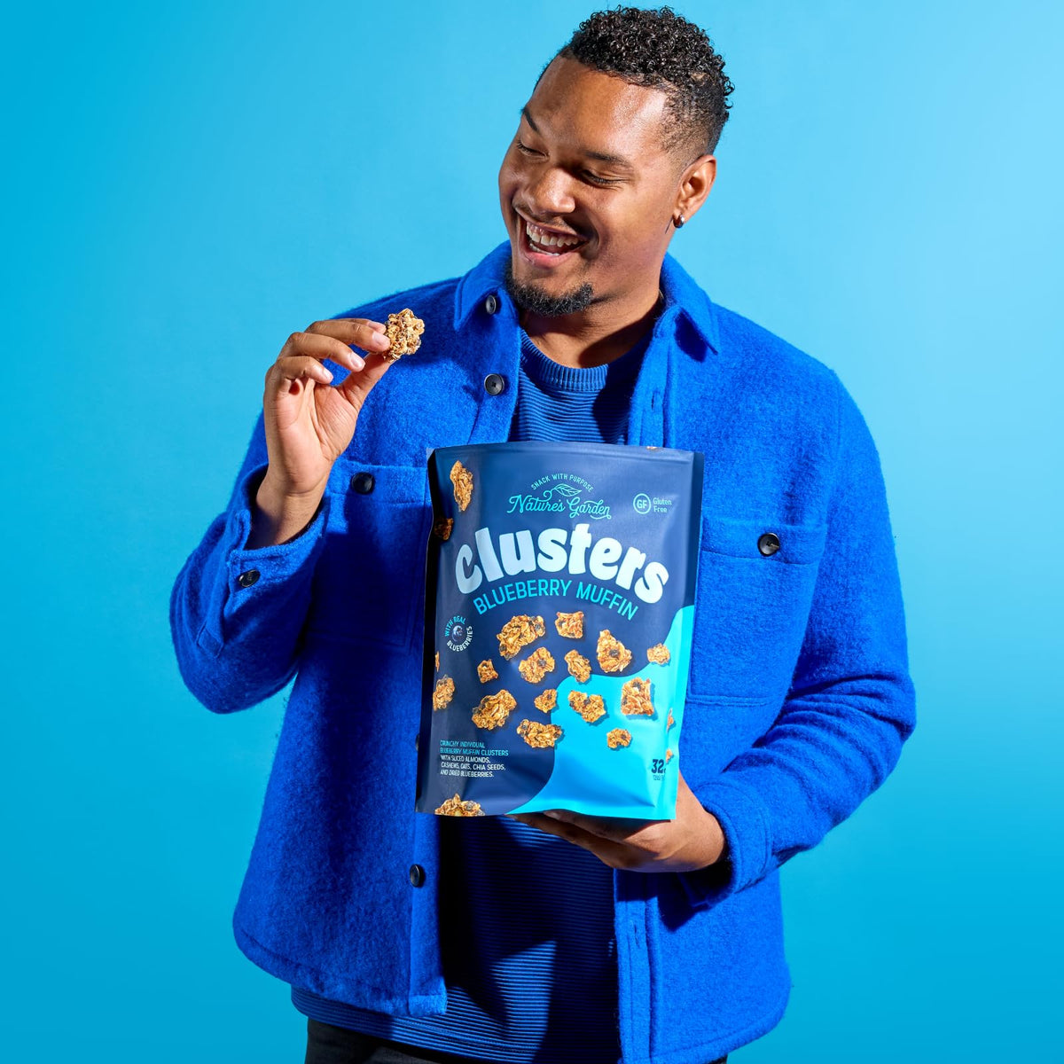 Gluten-free and non-GMO labels highlight Nature's Garden Blueberry Muffin Clusters' clean ingredients.