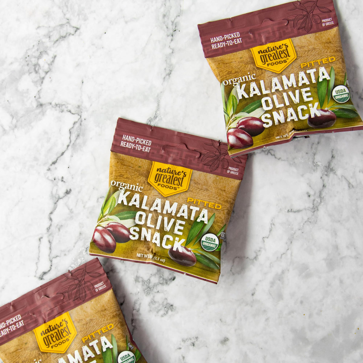 Charcuterie board with Nature's Greatest Foods Kalamata olives for entertaining