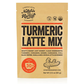 Nature's Harvest turmeric latte mix bottle pour shows convenient, caffeine-free indulgence