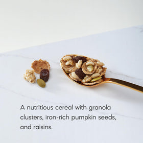 Nature's Path flax plus granola clusters close-up highlights grain-rich crunch.