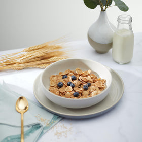 Nature's Path Heritage Flakes scooped into a bowl for breakfast