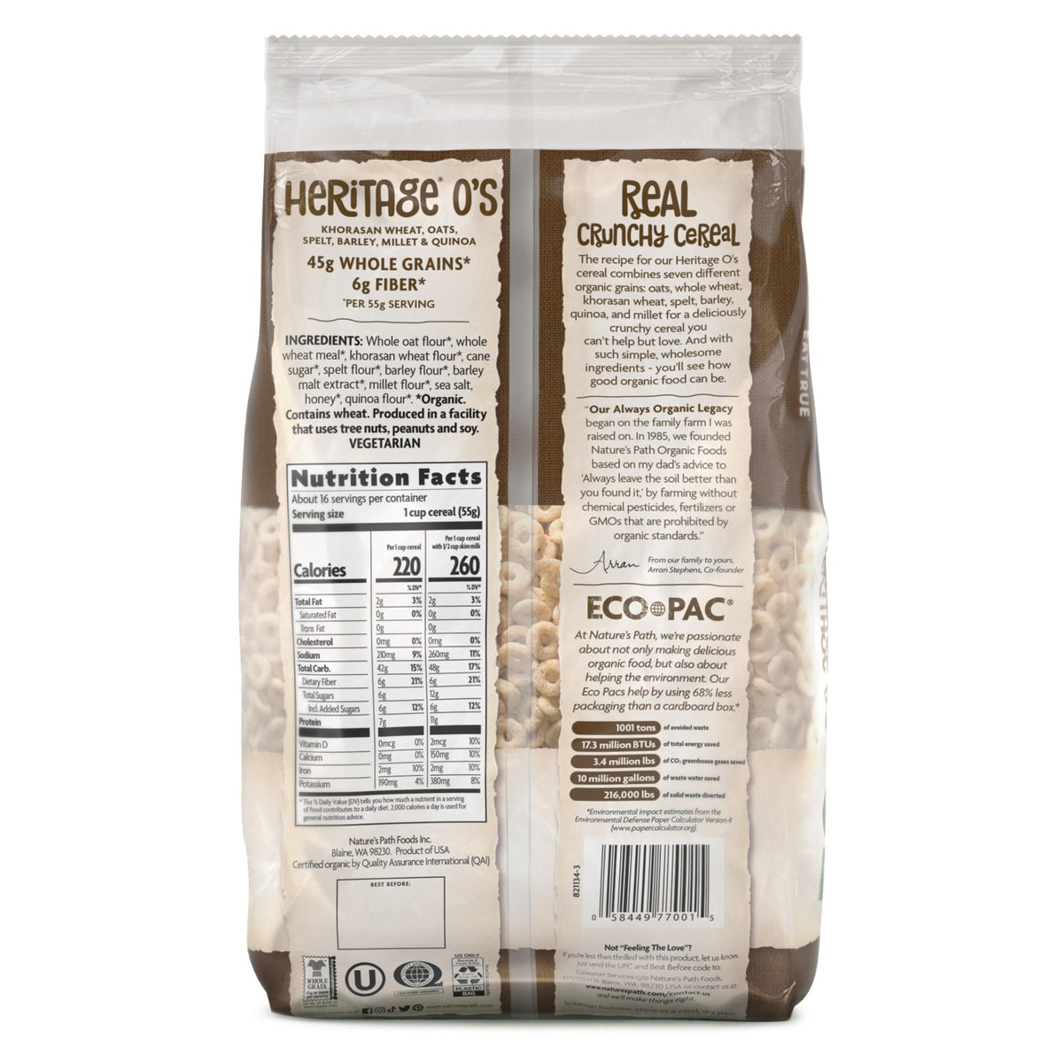 Spoon scooping Heritage O's with visible oats and quinoa texture.