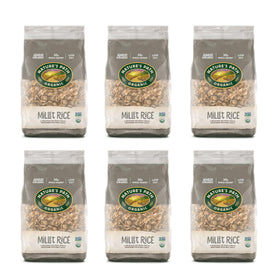 Nature's Path millet rice flakes cereal being poured into milk for quick crunch